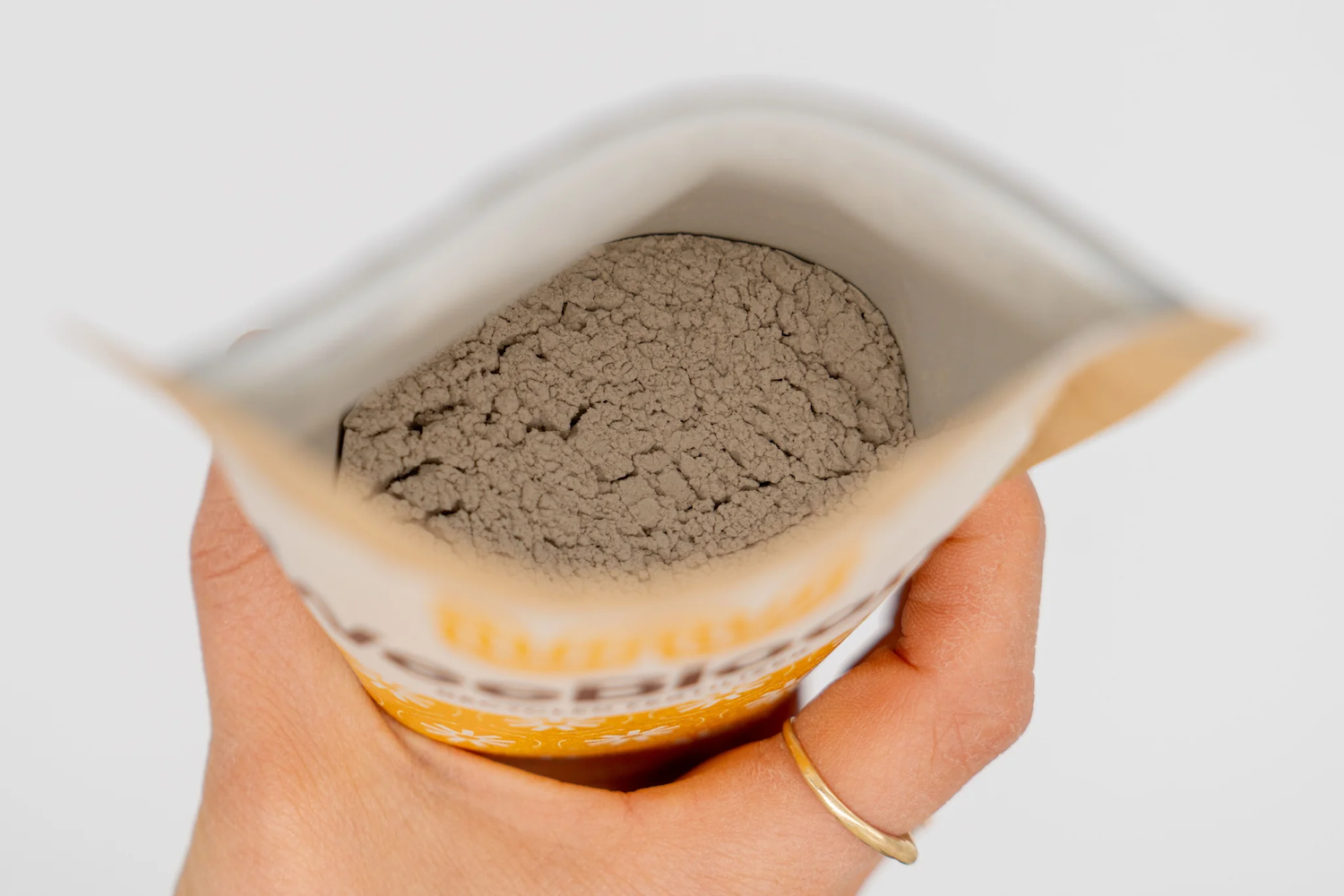 An open package of WeeBloom fertilizer as seen from above.